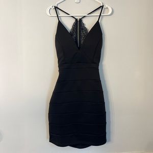 Black mini dress with open back